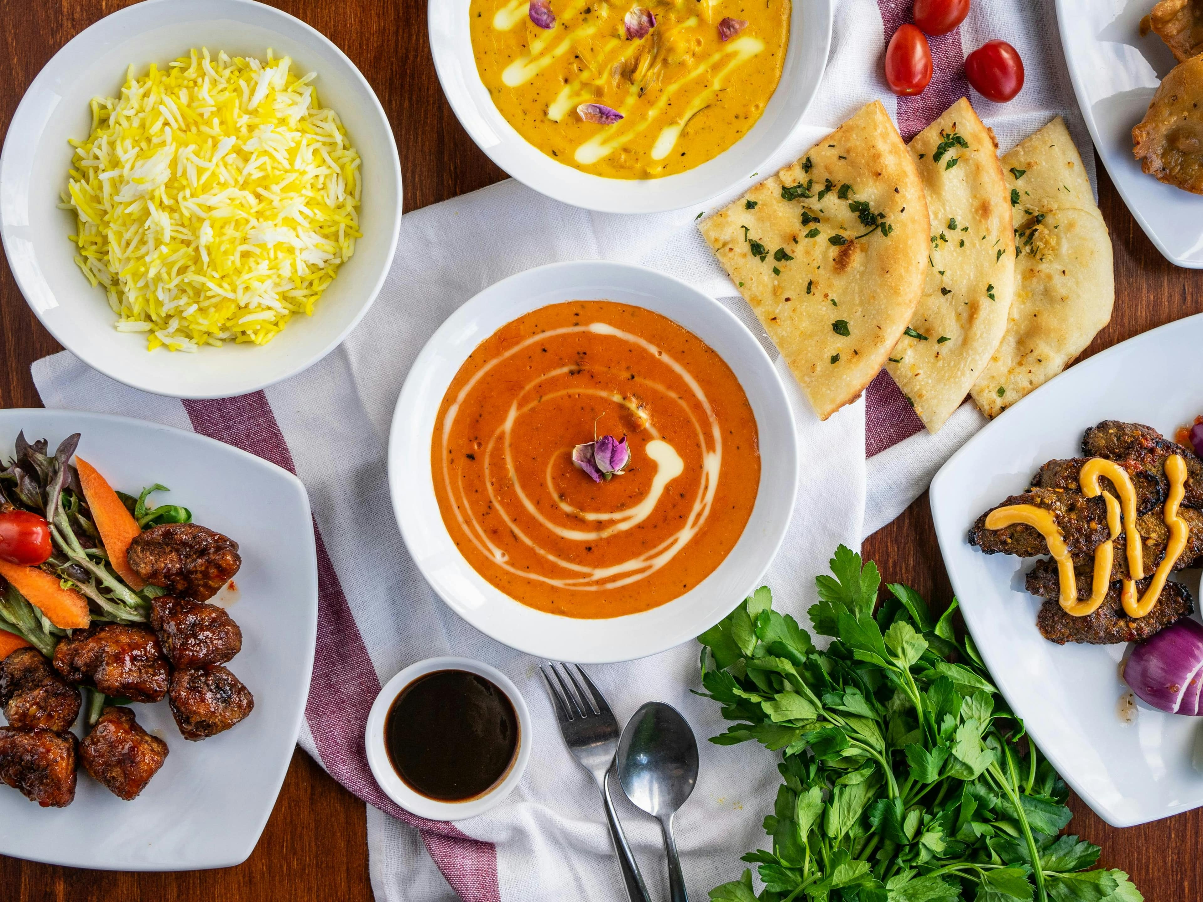 A private dining table with generous Lahori dishes