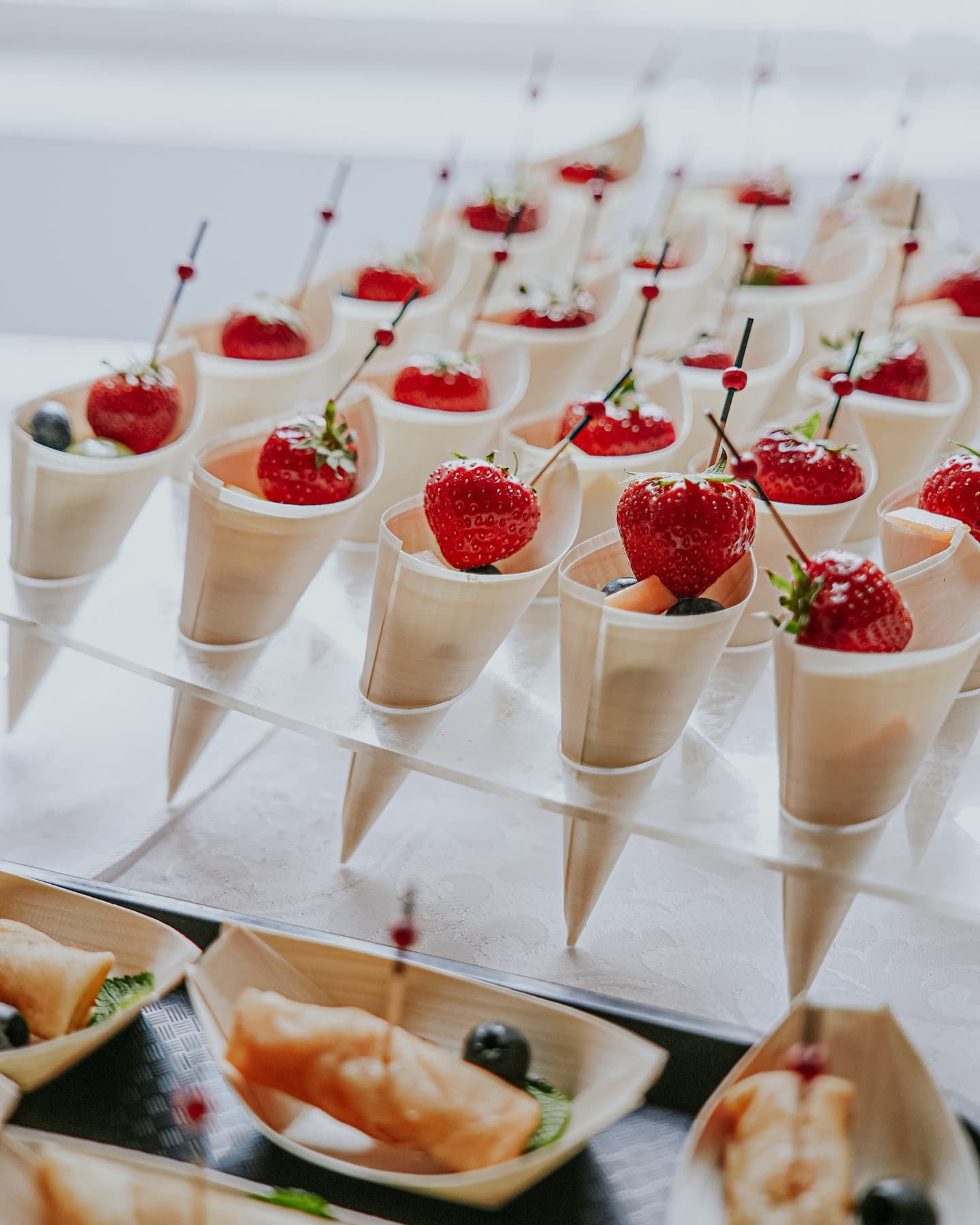 Mini dessert cones prepared for an intimate catered table